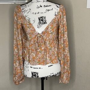 610 - Daisy and Delilah NWT Orange Floral Long Sleeve Crop Top, Size Medium